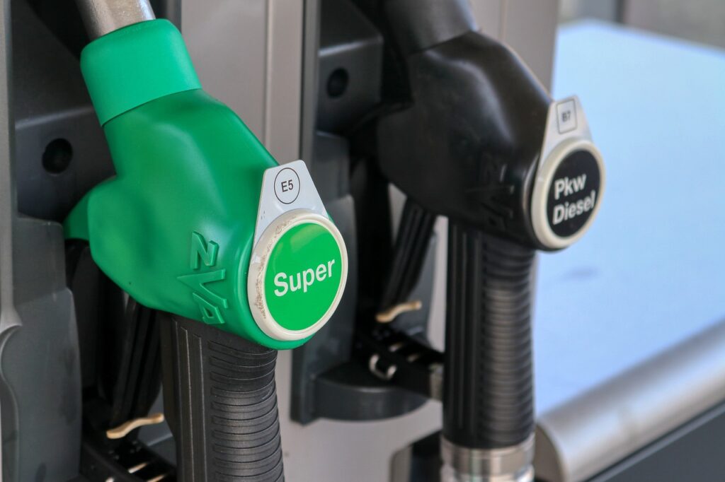An image depicting fuel pumps highlights the crucial need for fuel delivery services when your tank runs empty.